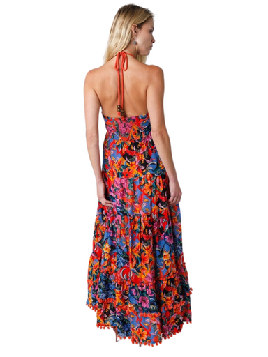 Spice up your wardrobe with the Katy Dress. This eye-catching maxi dress features a playful tie neck and a vibrant multi-colored floral combo print. Dress it up with a heel for a special occasion, dress it down with a sandal for everyday wear.