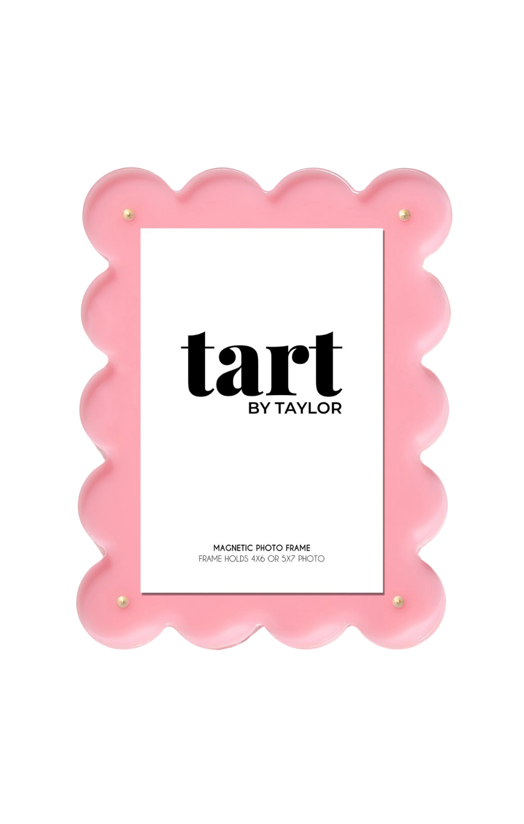 A light pink acrylic picture frame with a scalloped border, standing upright with a white label that reads 'tart by taylor'.