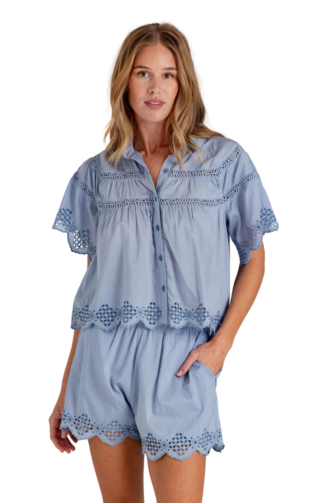 Short sleeve button-down shirt
Embroidered scallop hem detail
Lightweight woven fabric
80% cotton / 20% silk
Rainwash Blue colorway