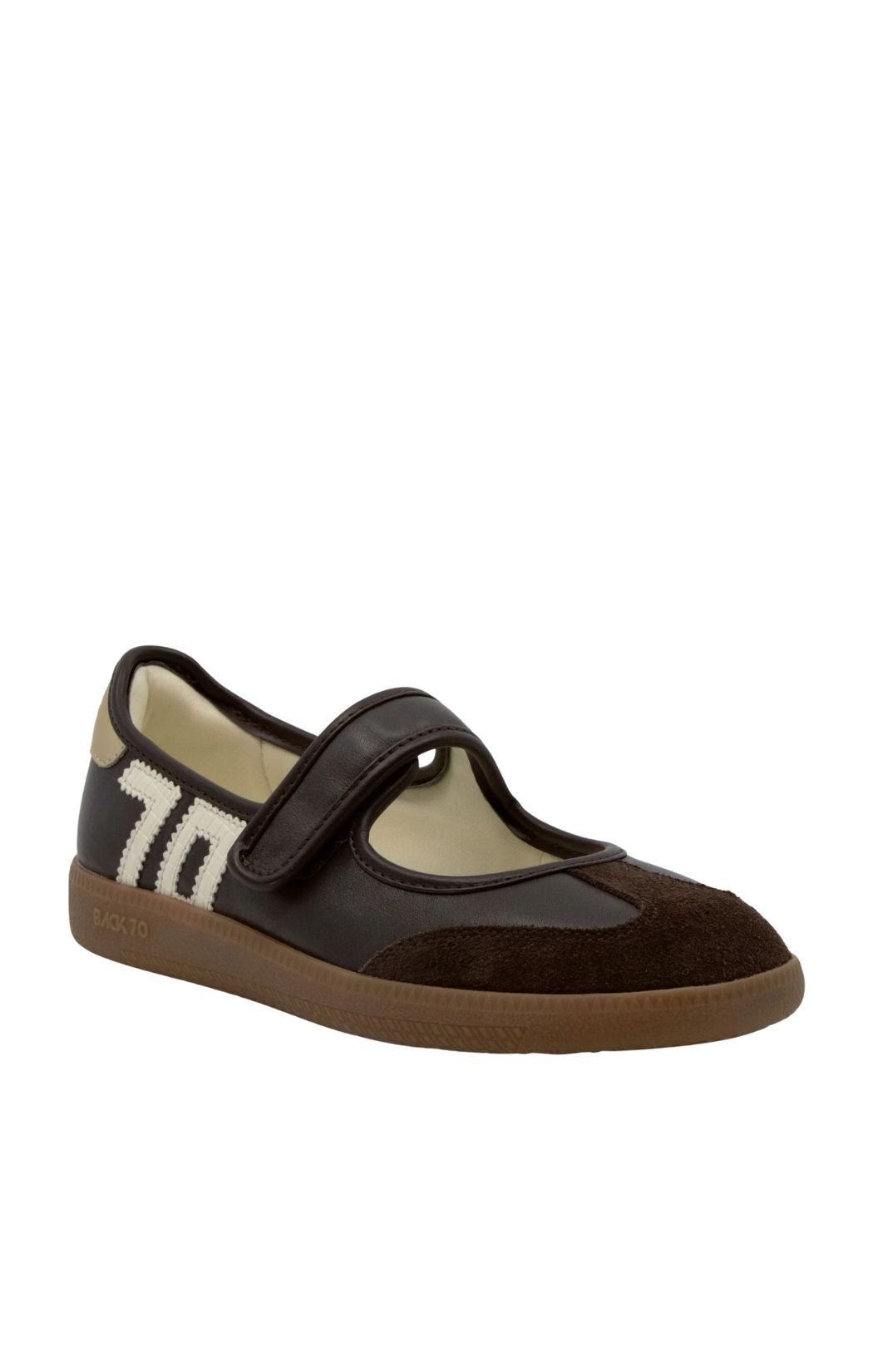 Back 70 Aya Mary Jane sneaker in coffee brown leather with a suede toe cap, adjustable strap, ivory 70 logo, and gum sole, shown from an angled side view.
