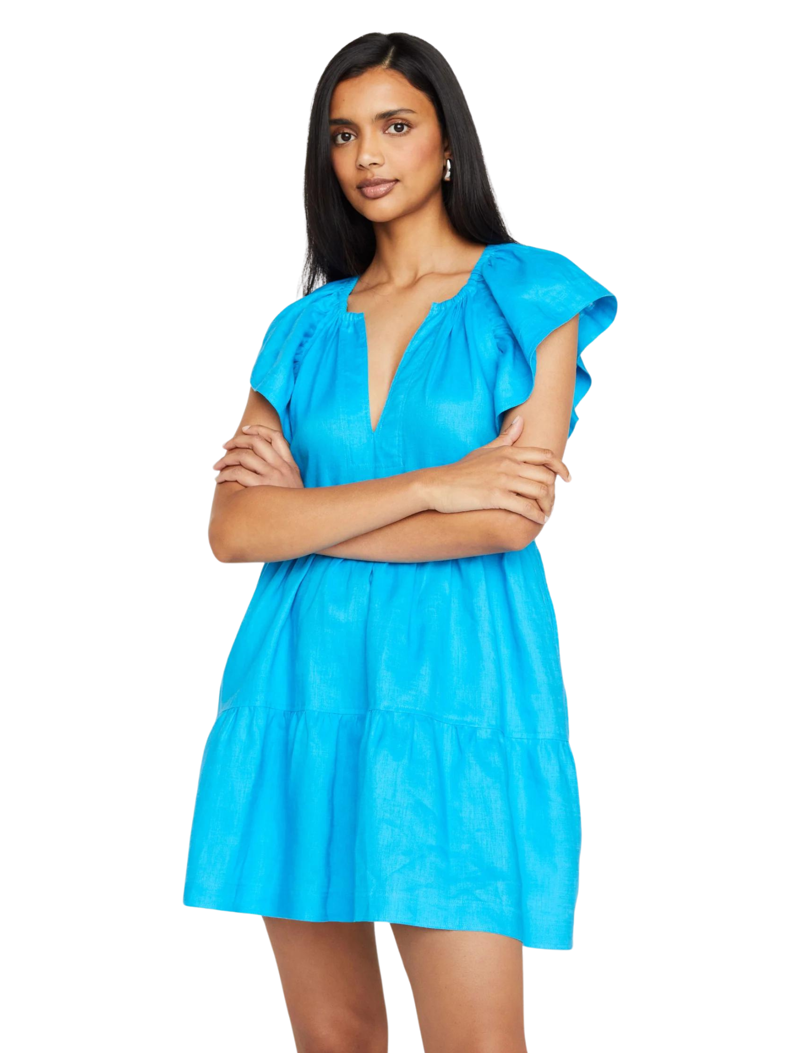 The Kara Dress by Marie Oliver offers an easy slip-on silhouette, wide flutter sleeves, and tiered skirt. The 100% linen fabric and relaxed fit provide unbeatable comfort, quality, and versatile style. Blue dress.