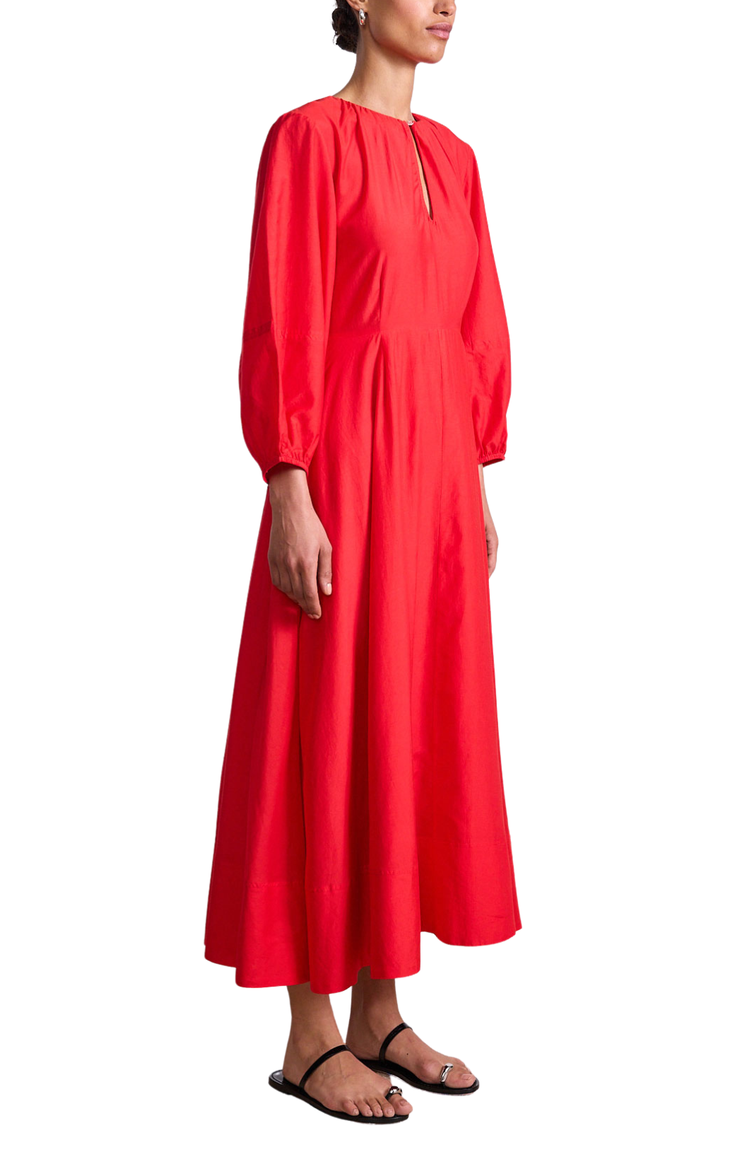 Woman wearing a red dress on a white background