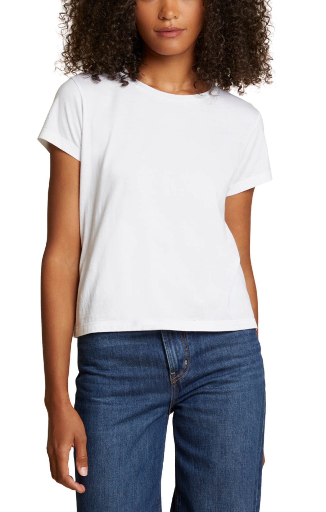 Person wearing a plain white t-shirt and blue jeans on a white background