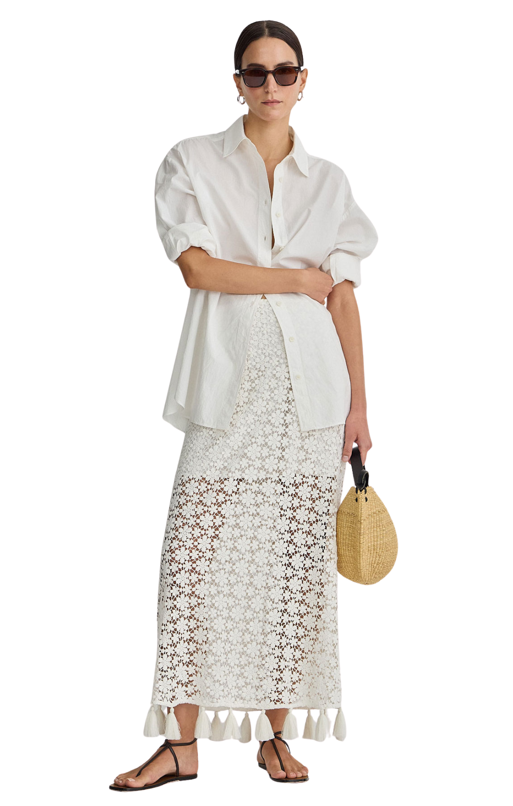 Color: Cream
Material: 100% Cotton
Column silhouette
Tassel details
Midi length skirt with lining above the knee
Cinq a Sept