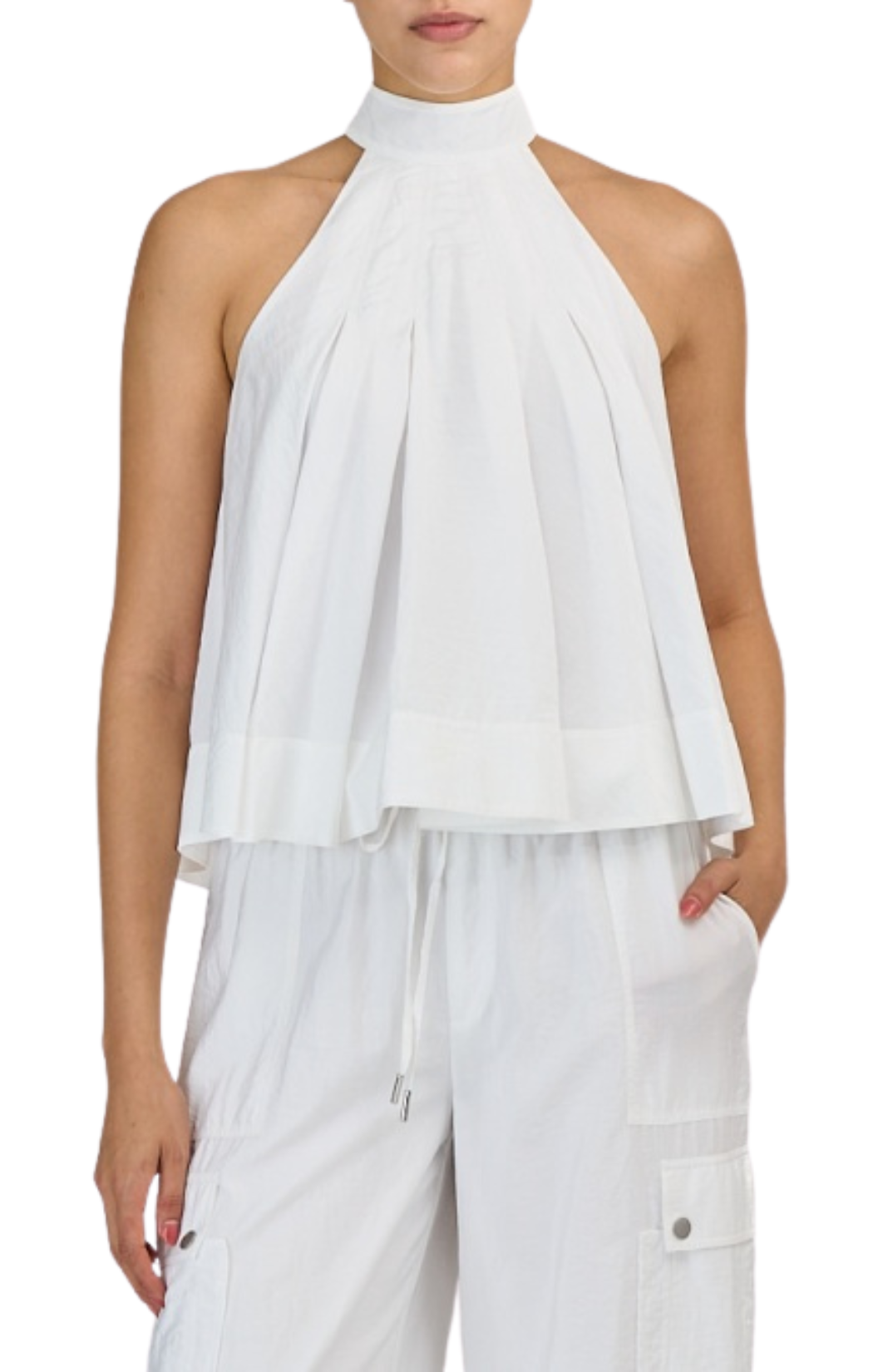 White halter silhouette. Featuring a chic mock neckline, soft pleating, and a statement bow tie at the back collar by Cinq a Sept.