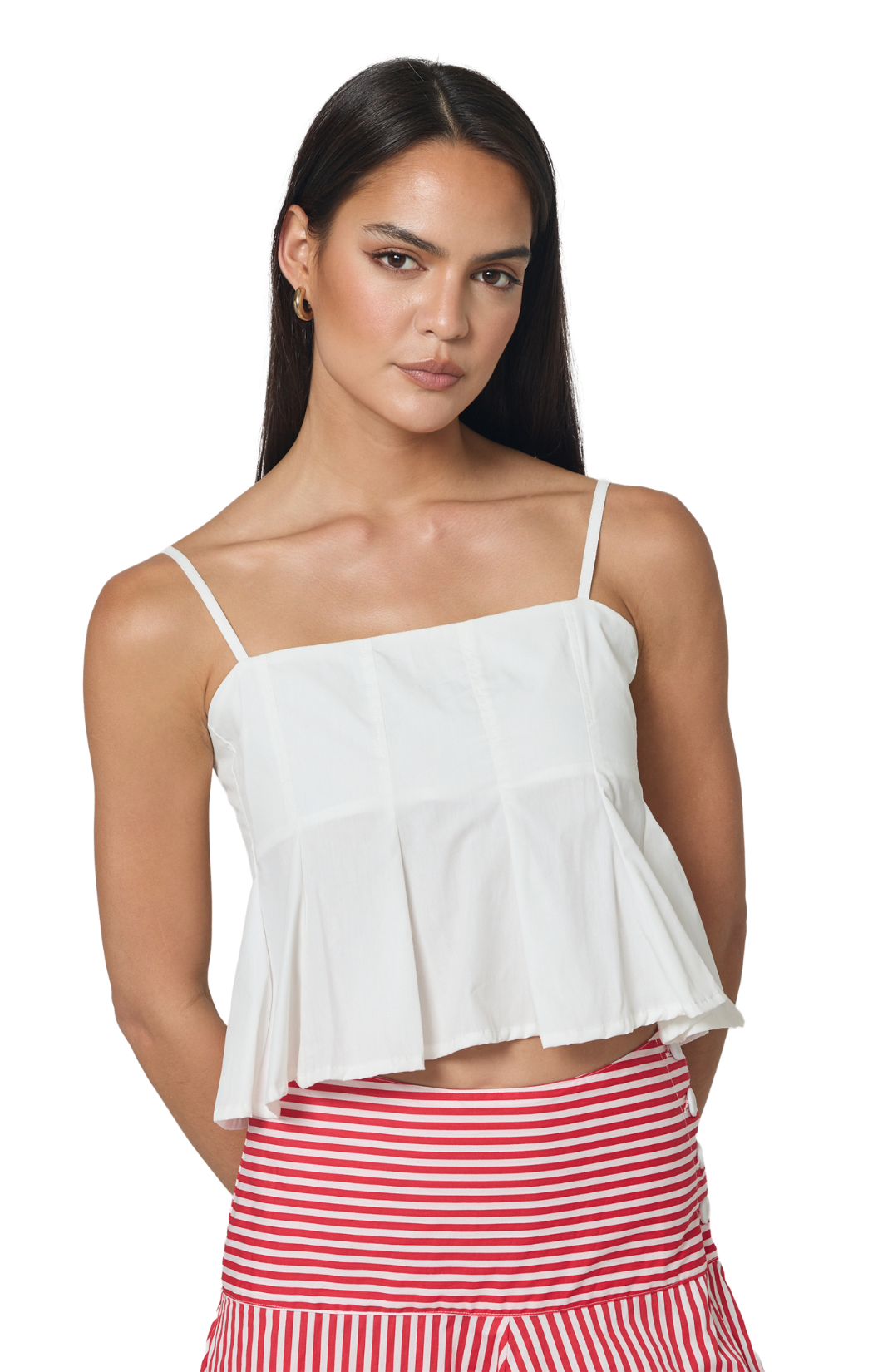 White cropped strap top in cotton poplin with slight flare and pleating toward the bottom