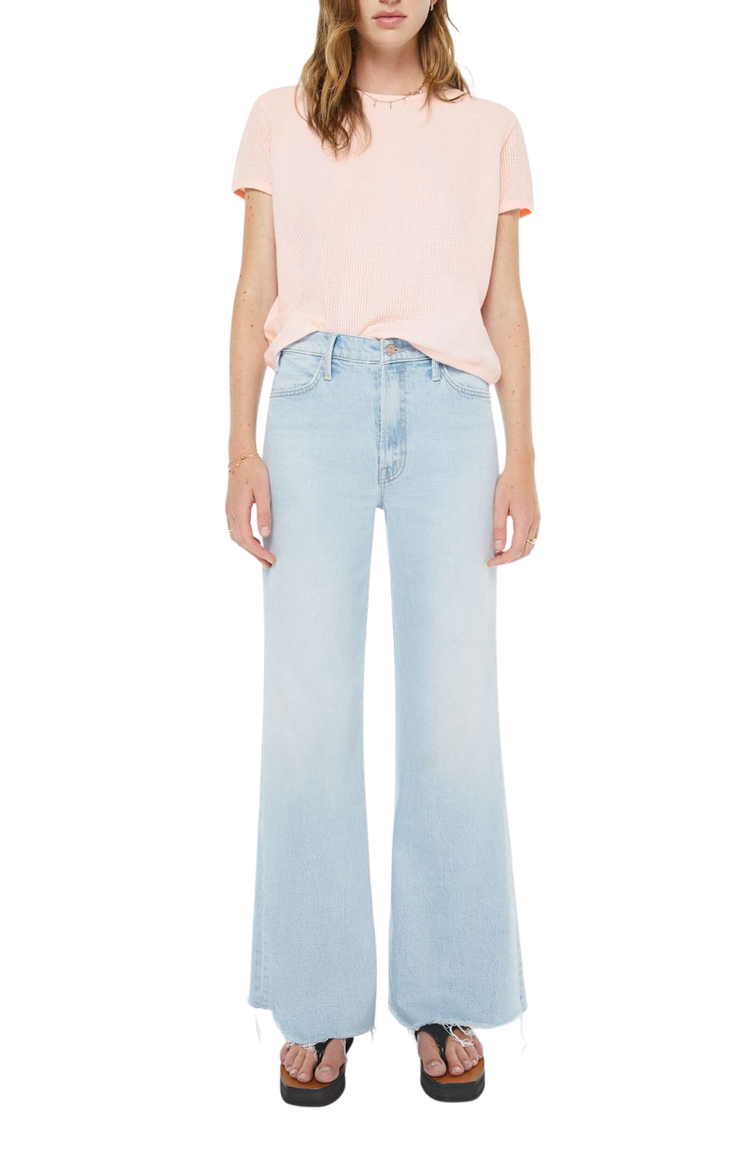 Jeans in light wash 70s-inspired wide leg with a zip fly, high rise, 31-inch inseam and a frayed hem. Made from denim with a touch of stretch